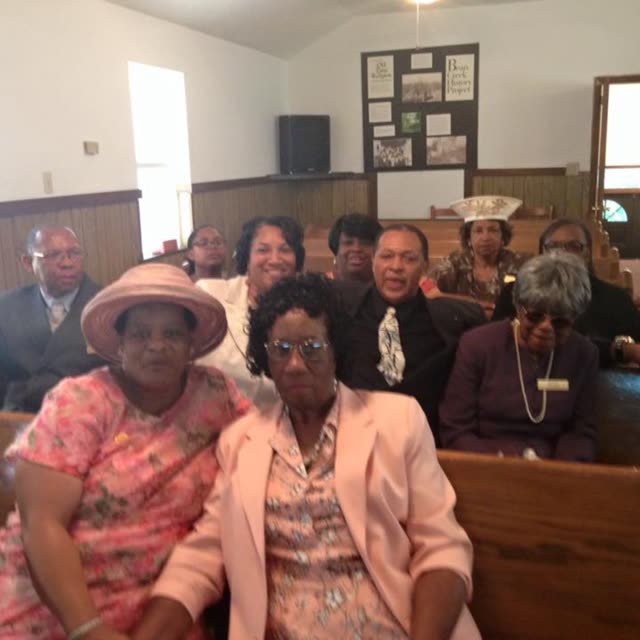 Women seated in the pews during a service.